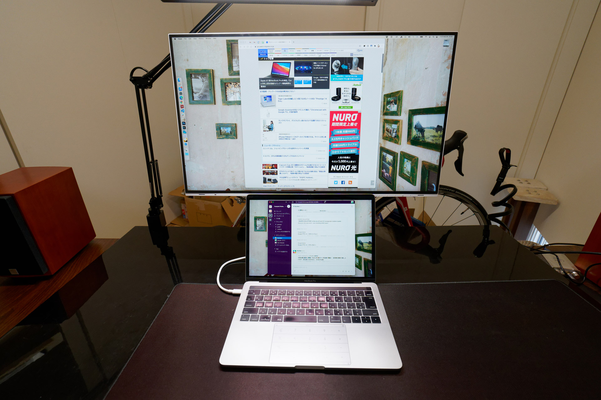 The stand's freely adjustable height makes it possible to place the 13-inch MacBook Pro underneath.